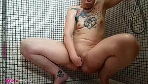 In the steamy shower, a European slut eagerly takes a monster cock in her ass, using dildos and toys for intense assfucking.