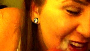 the guy enjoys a sloppy blowjob from the babe in this second movie scene