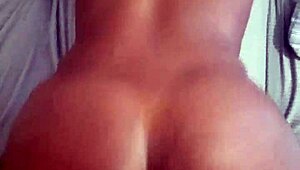 Mistress oils up her slaves for bed play