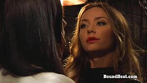 So these tied up lesbian slaves are getting humiliated by the dominant madame with her big tits.