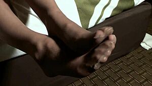 reagan lush teases with oiled pantyhose legs in footjob fun