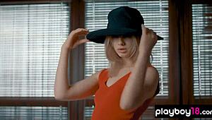 this ukrainian blonde strips and poses her shaved ass solo