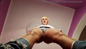 blonde femdom dominates old cuckold in intense bdsm session with whips and chains