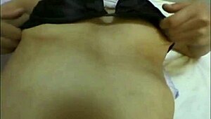 Japanese brunette amateur explores self-pleasure using a dildo in private