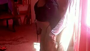 The Latina MILF gets fucked standing by a young stud without mercy