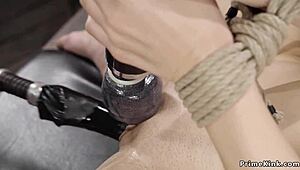 Watch this tied blonde beauty get banged hard by the machine!