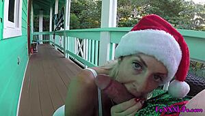 Busty blond Santa helper gets facial in POV