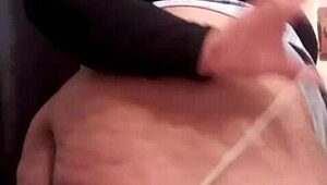 Watch this busty ebony milf play with her pussy