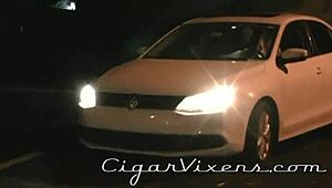 Crystal frost smokes a cigar in stockings and lingerie