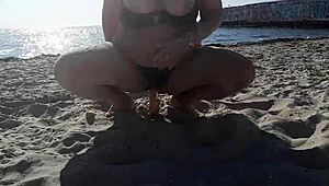 Milf shows big tits during outdoor public massage