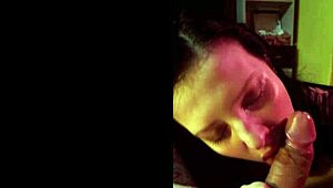 At the party, she couldn't resist sucking a stranger's cock, her cute lips wrapped around it eagerly as the night unfolded.