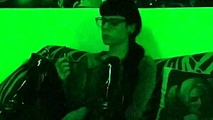 Hungarian goth mistress smokes in green light setting