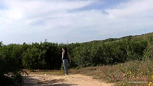 Young brunette rubs her pussy