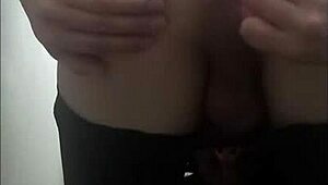 Sexy travesti plays with anal balls under clothes