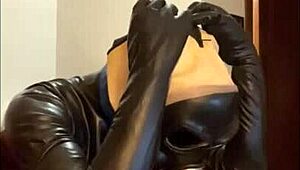 Wearing a tight gas mask for intense latex-rubber fetish play