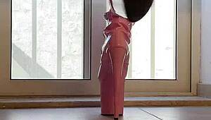 walking tall in pink boots a captivating vision of domination and heels on her ass