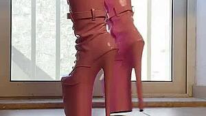 walking tall in pink boots a captivating vision of domination and heels on her ass