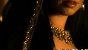 she's a sexy bollywood brunette dancer, stripping and teasing.