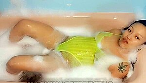 European girl masturbates to intense orgasm in shower