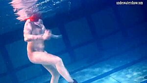 Hanging out by the pool with this sexy Russian teen, Bulava Lozhkova, showing off her big boobs and ass underwater.