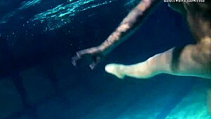 Hanging out by the pool with this sexy Russian teen, Bulava Lozhkova, showing off her big boobs and ass underwater.