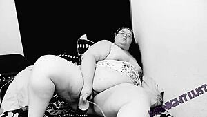 bbw uses big black dildo to fill herself up at midnight