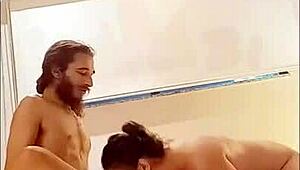 Two guys making her cum with big cocks in group action.