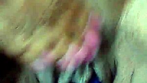 Ebony woman uses dildo for masturbation