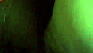 Ebony woman uses dildo for masturbation