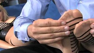 Oh, she gives a nasty footjob with her sexy legs!