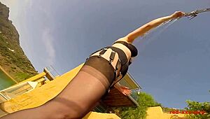 Mature Redhead Masturbates Outdoors by Pool in Stockings