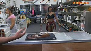 Ghetto woman sells traditional mask in interracial reality setting.