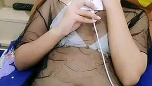 asian stripper teasing with clothes ripped during striptease