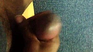 Watch this black guy rubbing his monster cock.
