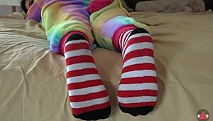 Asian cosplayer rips clothes in striped socks striptease solo