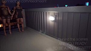 i watch twin goho and feedme suck monster cocks on the rooftop in this voyeur ebony scene