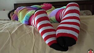 Asian cosplayer rips clothes in striped socks striptease solo