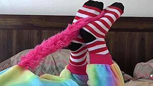 Asian cosplayer rips clothes in striped socks striptease solo