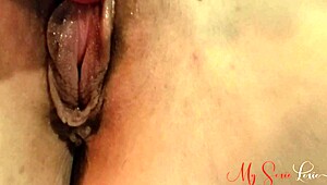 Masturbating with a clit vibrator brings Lexie to intense orgasm at home.