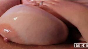 Busty BBW Wife Oils Up Her Huge Tits