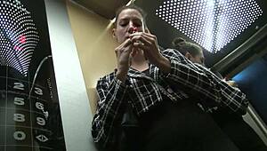 elevator secretary masturbates to orgasm with vibrator in heels and glasses