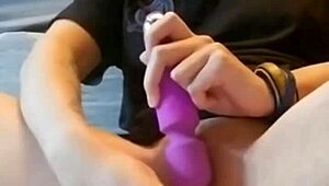 trying out a new toy for enhanced pleasure