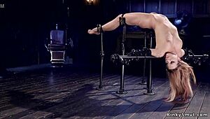 flexible brunette in bondage session with kinky bdsm elements