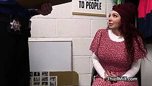 Oh wow, that big titty redhead milf is sucking cock in the office!