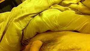 Bedroom wank with long thin cock ends in massive cumshot explosion