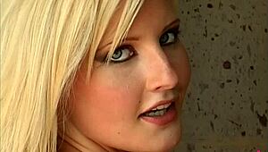 Busty Michelle Marsh, the sexiest woman alive, shows off her big tits in a stunning model shoot. Her boobs steal every scene!