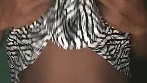 Naked girl twerks her big ass on the beach, showing small tits