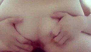 Woman Gets Horny With Flowing Juices And Wrapped Cock