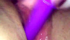 this wet wife is masturbating lesbian style, getting all soaked