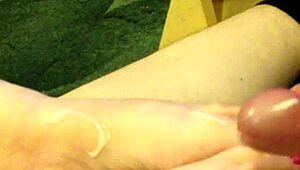 my wife gives a hot footjob with pink toenails and cumshot